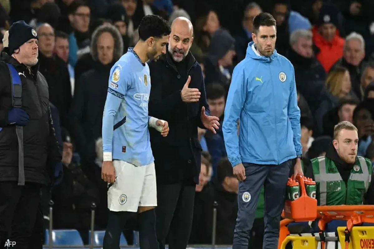 جوارديولا وعمر مرموش