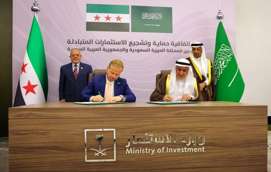 أثناء توقيع الاتفاقية بين سوريا والمملكة العربية السعودية
