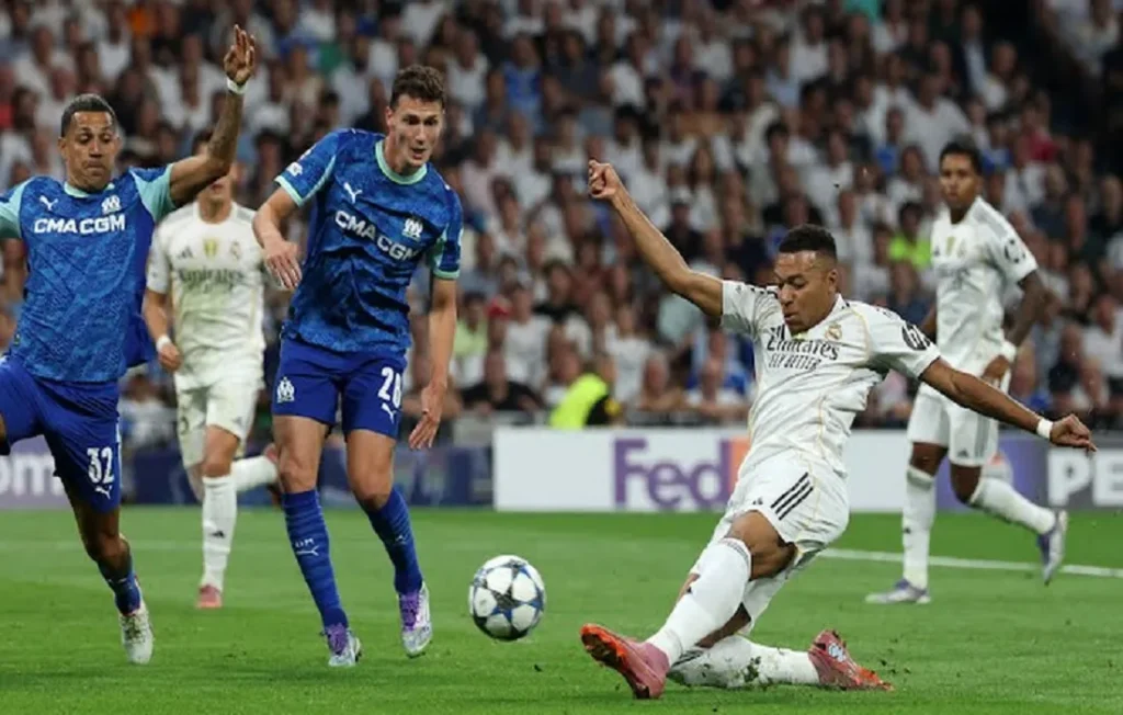 ريال مدريد الإسباني وأولمبيك مارسيليا الفرنسي (صورة من رويترز)