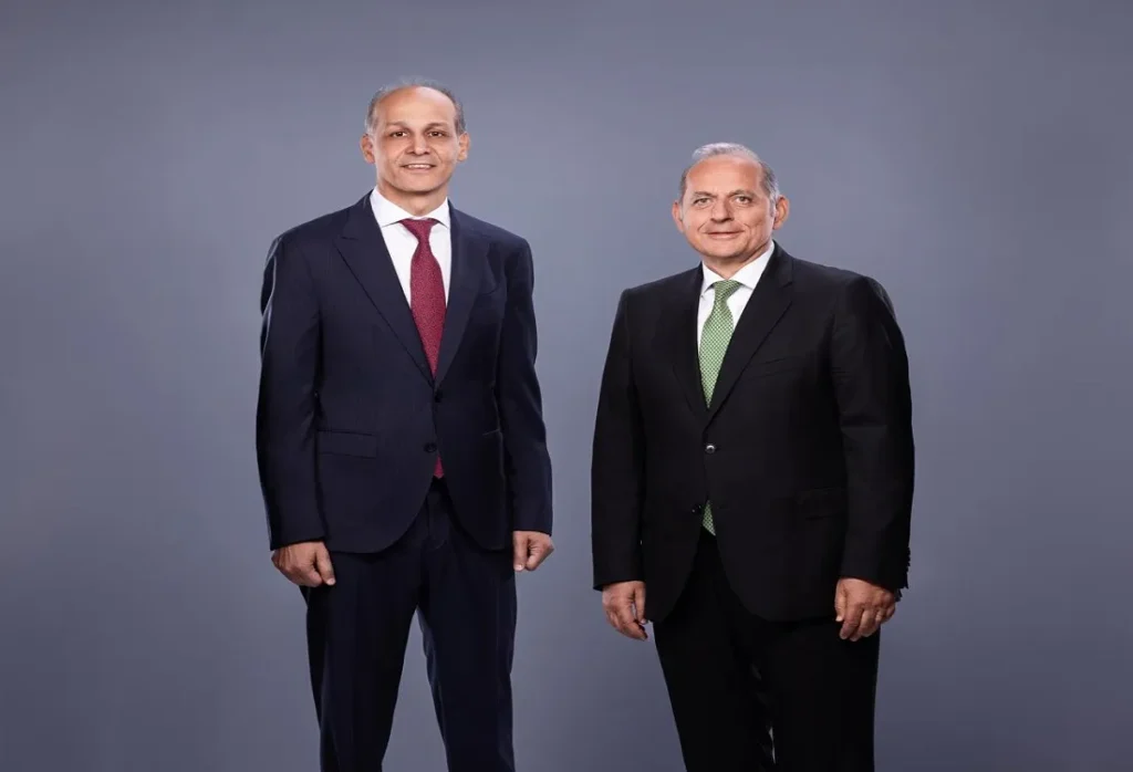 هشام عكاشة الرئيس التنفيذي لبنك مصر وهاني السمرة رئيس قطاع الموارد البشرية