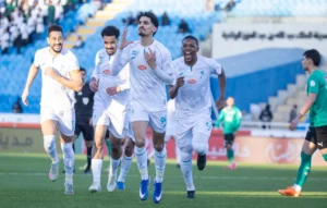 فرحة لاعبي الفتح بالهدف الأول في مرمى النجمة