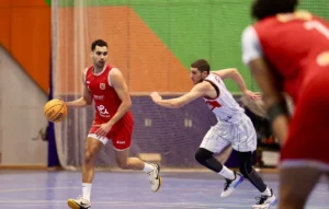 الأهلي مع سبورتنج السكندري في كرة السلة - أرشيفية